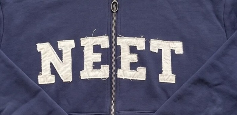 Stitched NEET lettering detail